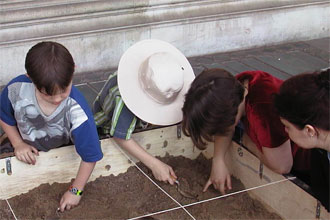 Primary school students on simulated archaeological dig - Alternative Settings PGCE